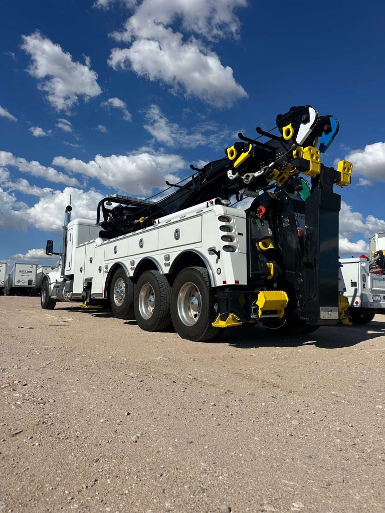white heavy duty tow trucked parked in Buckeye location parking lot