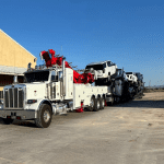 heavy duty semi truck towing car hauler